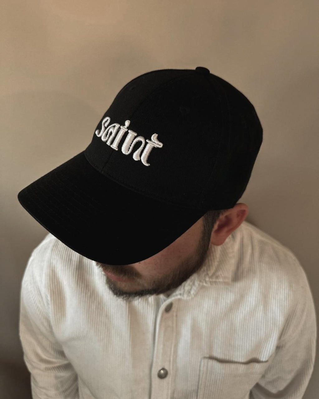 La casquette SAINT